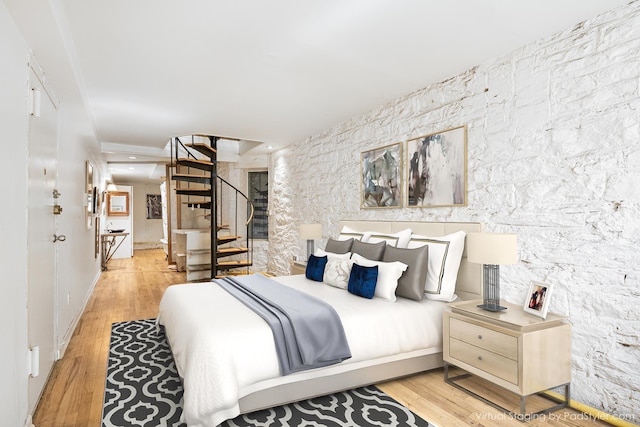 bedroom featuring light wood-type flooring