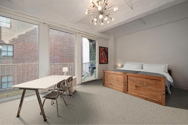 bedroom with an inviting chandelier, carpet, and access to outside