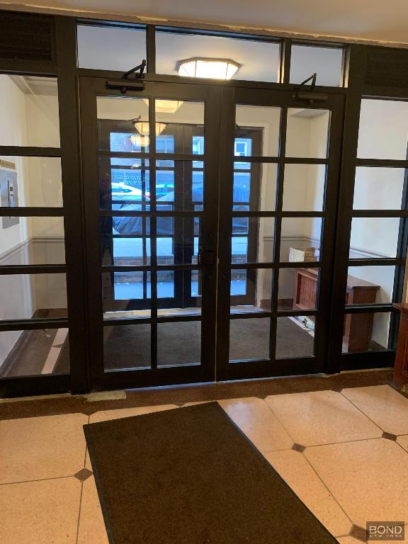 doorway to outside with french doors