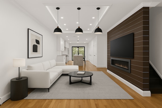 1241 Herkimer St, New York City, NY 11233 - living room featuring ornamental molding, light wood-style floors, a large fireplace, baseboard heating, and recessed lighting