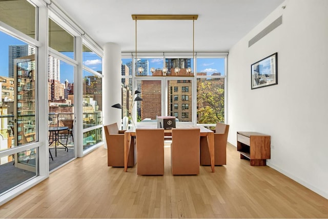 sunroom / solarium with a city view