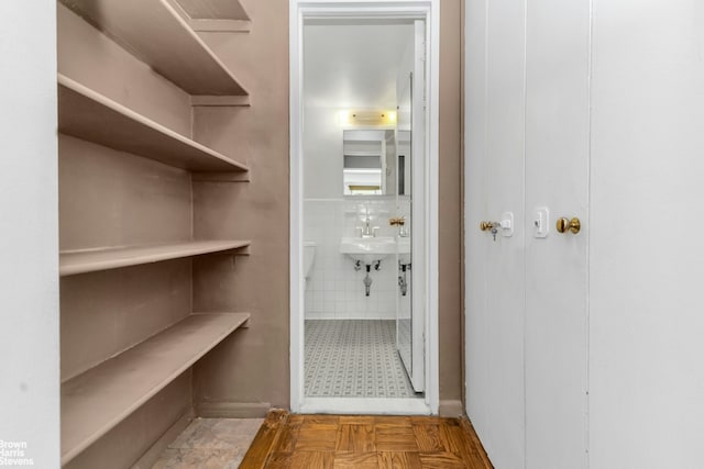 pantry with a sink