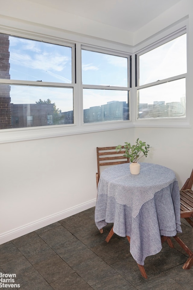 34-41 78th St Unit 6G, New York City, NY 11372 - dining space featuring healthy amount of natural light and baseboards