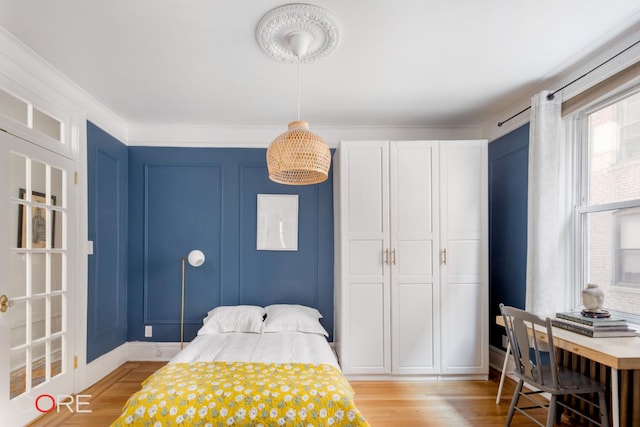 bedroom featuring light wood-type flooring