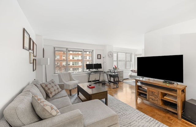 living room with light parquet flooring