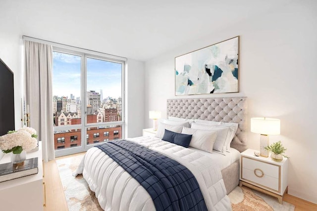 bedroom featuring a view of city