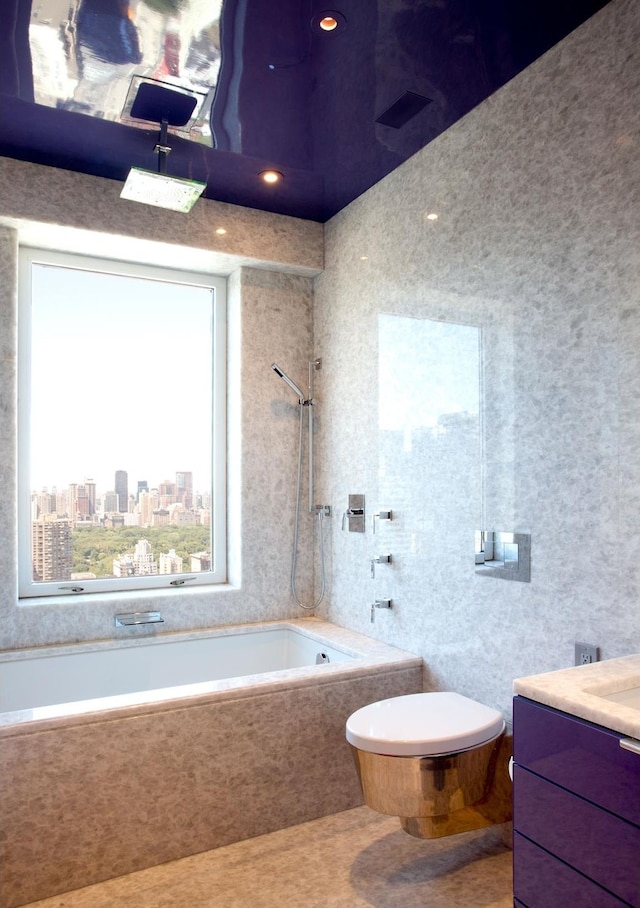 bathroom with a view of city, a combined bath / shower with marble appearance, tile patterned flooring, and vanity