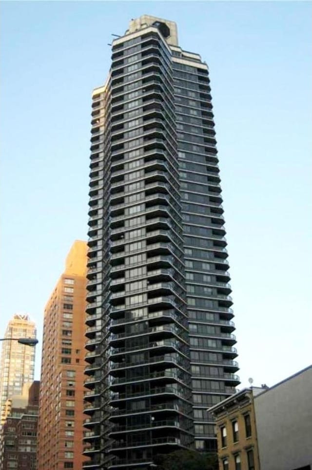 view of building exterior featuring a view of city