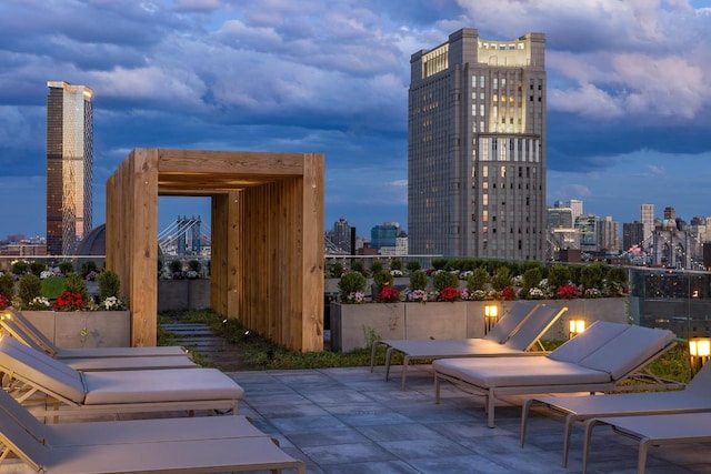 view of patio terrace at dusk