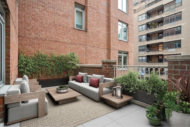 balcony with an outdoor hangout area