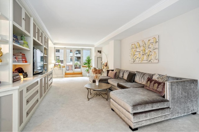 living room with french doors, ornamental molding, and light carpet