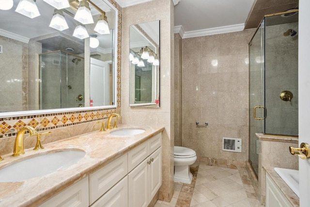 full bathroom featuring toilet, tile walls, ornamental molding, vanity, and independent shower and bath