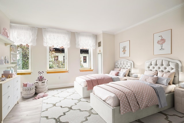 bedroom featuring light wood-style flooring, crown molding, and baseboards