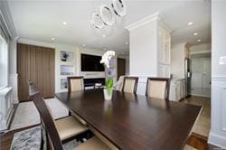 dining room featuring a notable chandelier