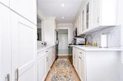 kitchen with white cabinets and sink