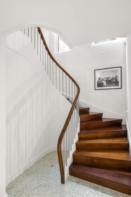 stairs featuring carpet floors