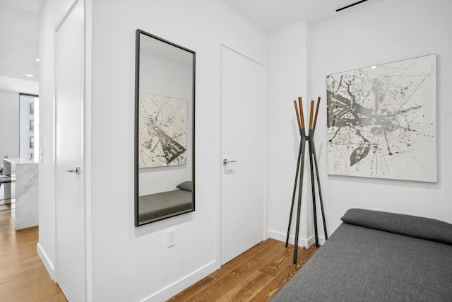 bedroom with wood finished floors