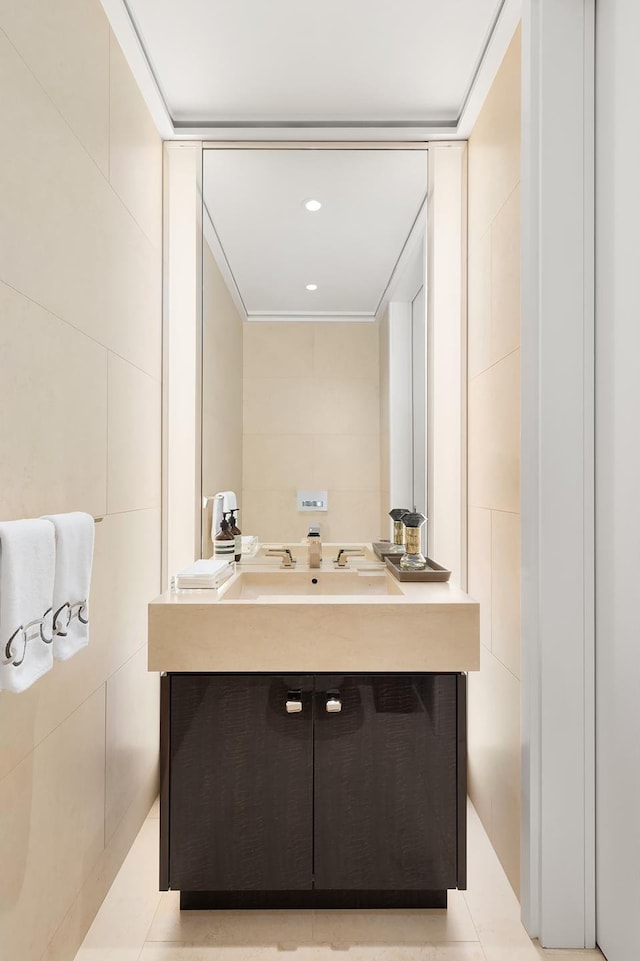 53 W 53rd St Unit 24A, New York City, NY 10019 - bathroom featuring tile walls and vanity