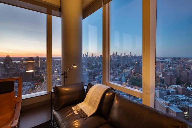 sunroom / solarium with a city view