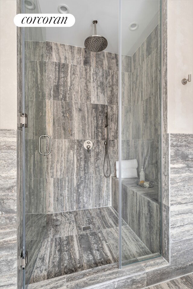 bathroom featuring a shower stall