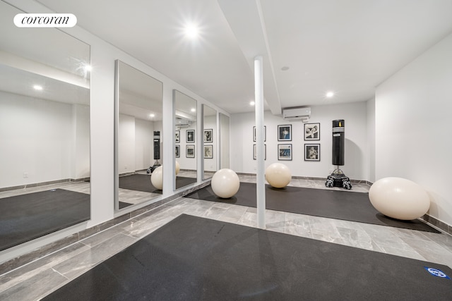 workout room featuring a wall mounted AC, visible vents, and recessed lighting