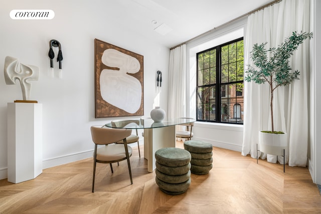 sitting room featuring baseboards and visible vents