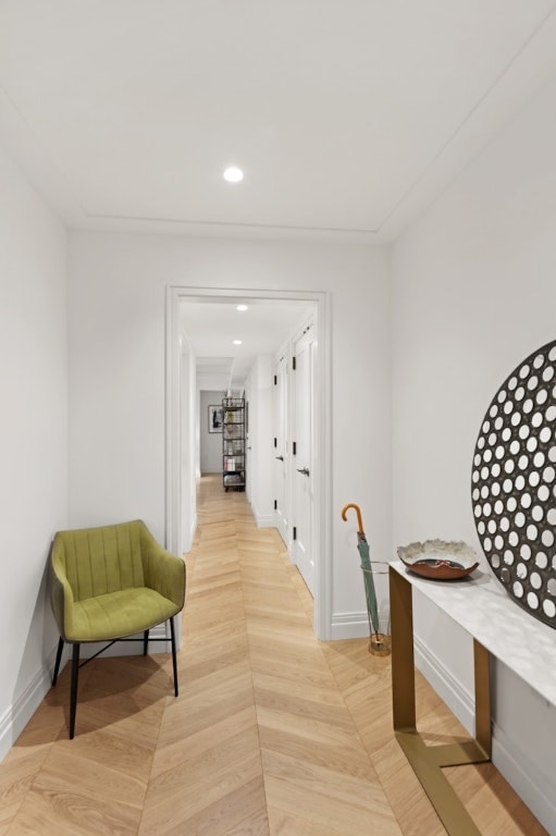 hallway featuring light parquet floors