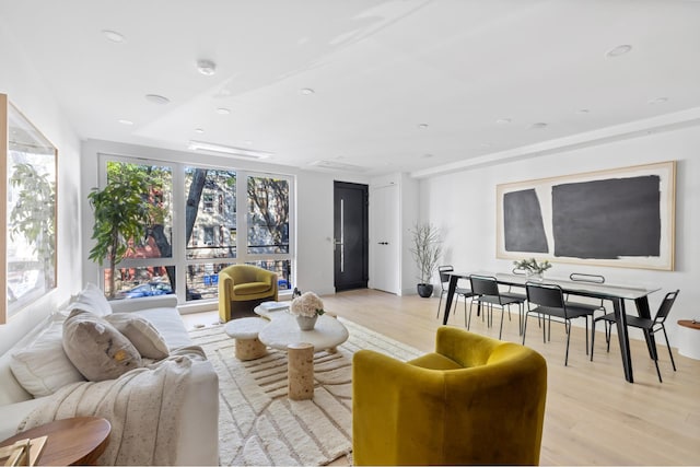 134 Weirfield St Unit 2, New York City, NY 11221 - living area with light wood-style flooring and recessed lighting