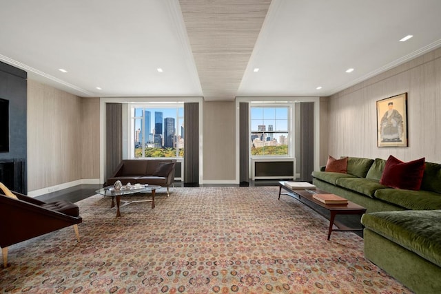 living room featuring crown molding and carpet floors