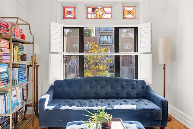 sitting room with hardwood / wood-style floors