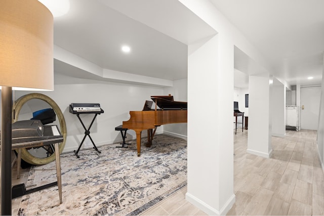 office area featuring recessed lighting, wood finished floors, and baseboards