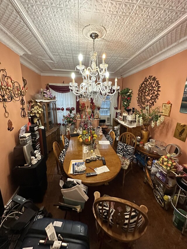 229 Nichols Ave, New York City, NY 11208 - dining space featuring a chandelier, an ornate ceiling, and crown molding