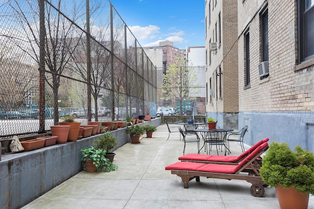 view of patio / terrace with fence and outdoor dining space