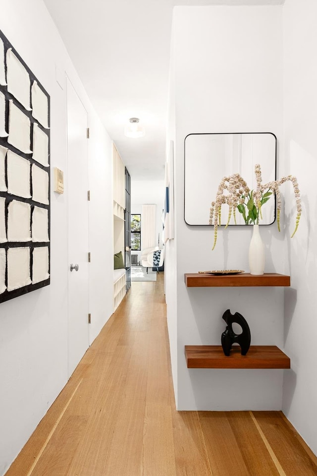 hallway with light wood-style flooring