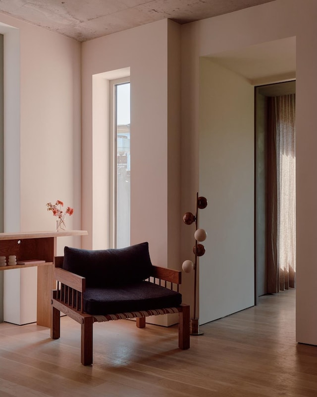 sitting room featuring light wood-style flooring