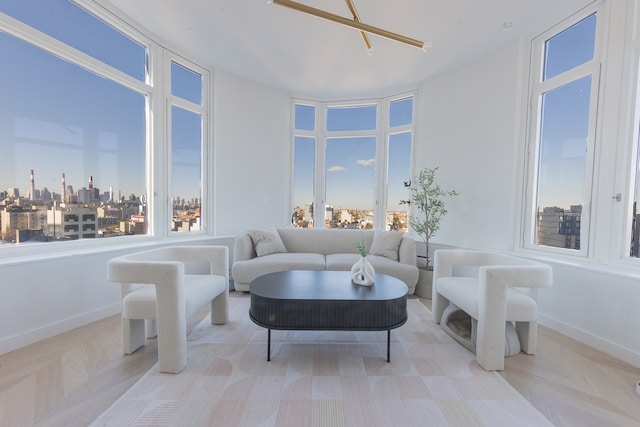 29-18 41st Ave Unit 14-C, New York City, NY 11101 - sunroom / solarium featuring healthy amount of natural light and a skyline view