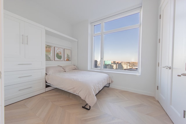 bedroom featuring baseboards