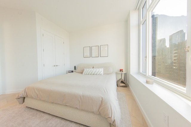 bedroom featuring light wood-type flooring