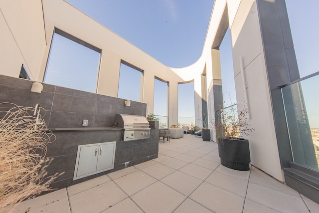 view of patio / terrace featuring grilling area and exterior kitchen