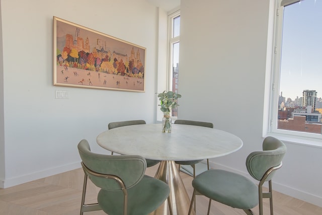 dining room with baseboards