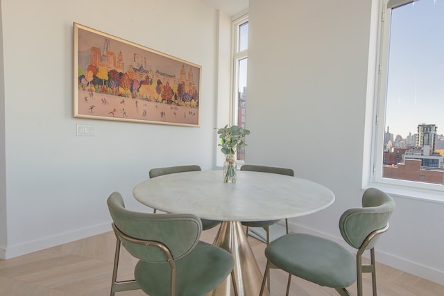 29-18 41st Ave Unit 14-C, New York City, NY 11101 - dining space with baseboards