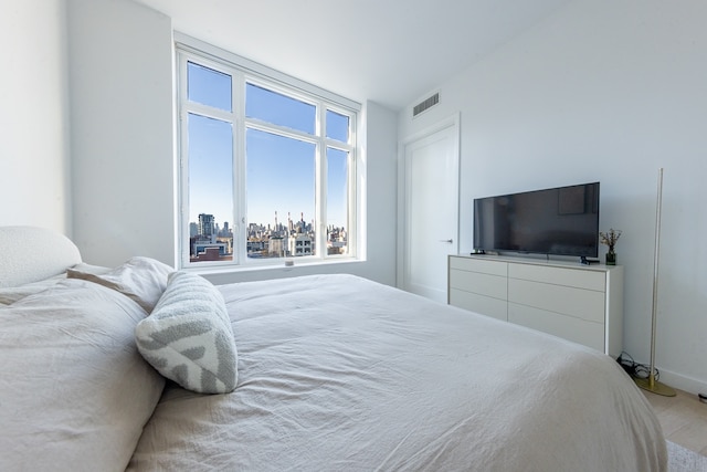 bedroom with visible vents