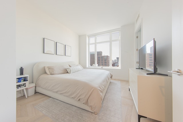 bedroom featuring visible vents