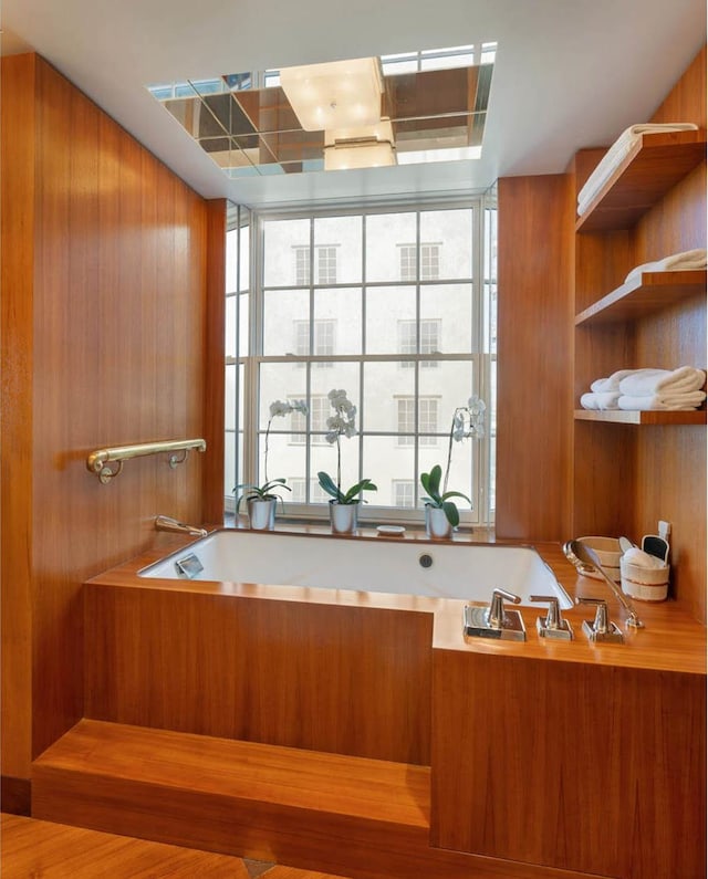 full bathroom with a garden tub