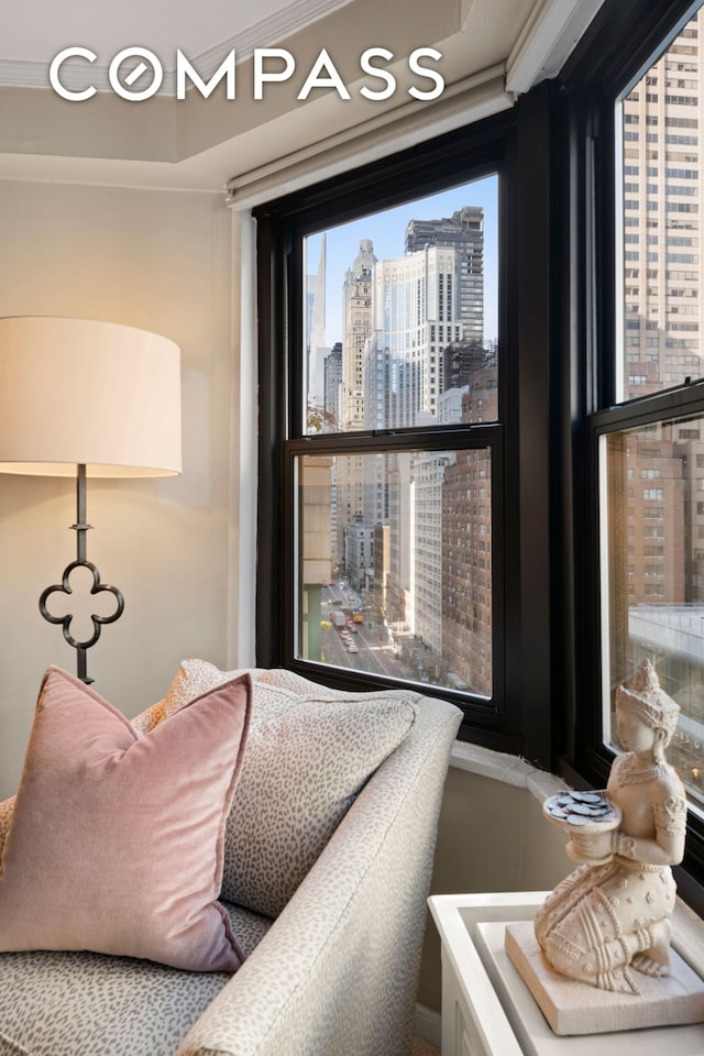 bedroom featuring a city view