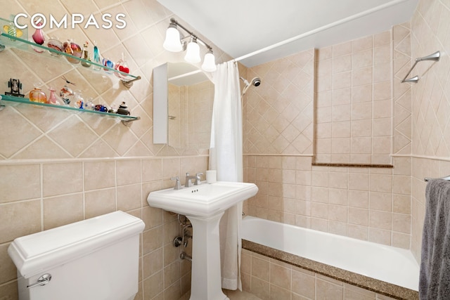 full bathroom with tile walls, toilet, tasteful backsplash, and tiled shower / bath combo