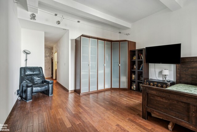 bedroom featuring hardwood / wood-style floors