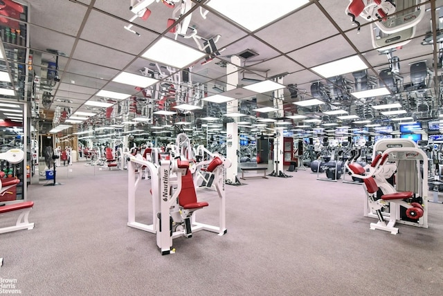 workout area with a drop ceiling