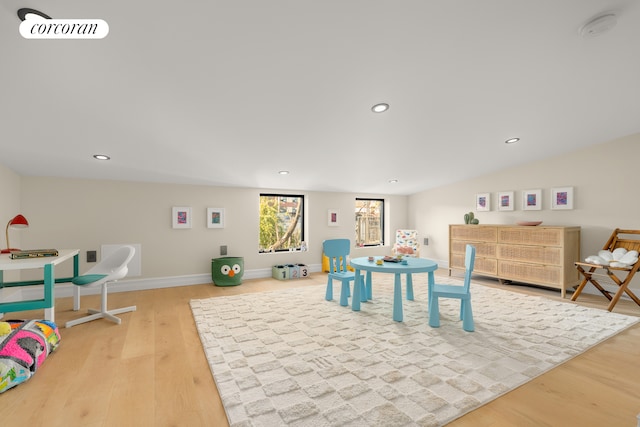 game room with recessed lighting, wood finished floors, visible vents, baseboards, and vaulted ceiling