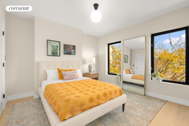 bedroom featuring light wood-type flooring